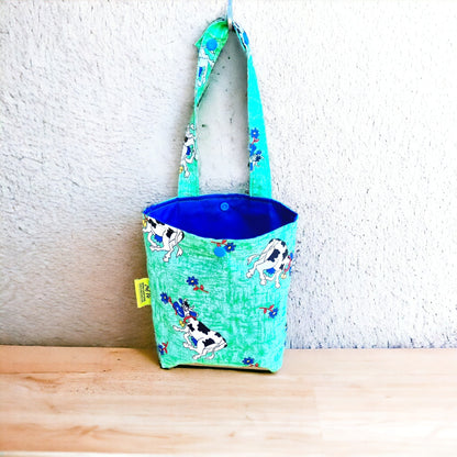 Car & Home Tidy Bag with cows and flowers on light green background