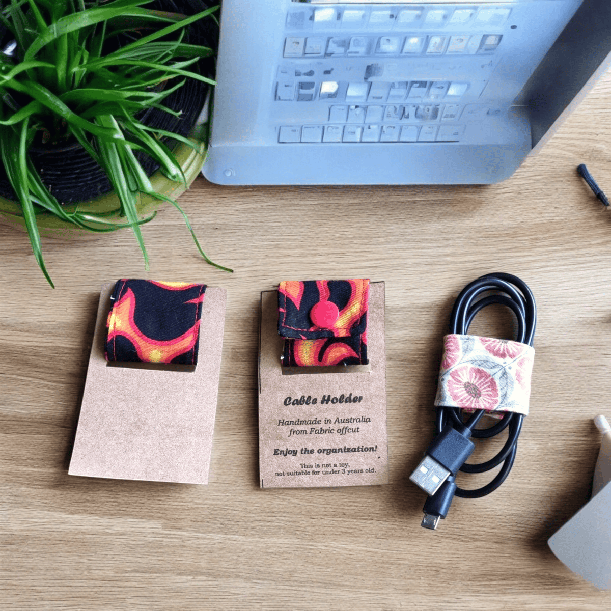 Flames pattern Cable Holder Organiser in workspace setting
